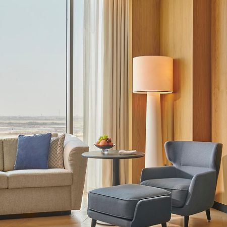 Отель Grand Hyatt Kuwait Кувейт Экстерьер фото A floor lamp