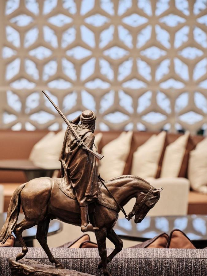 Отель Grand Hyatt Kuwait Кувейт Экстерьер фото Statue of Ibn Battuta at the Ibn Battuta Mall, Dubai